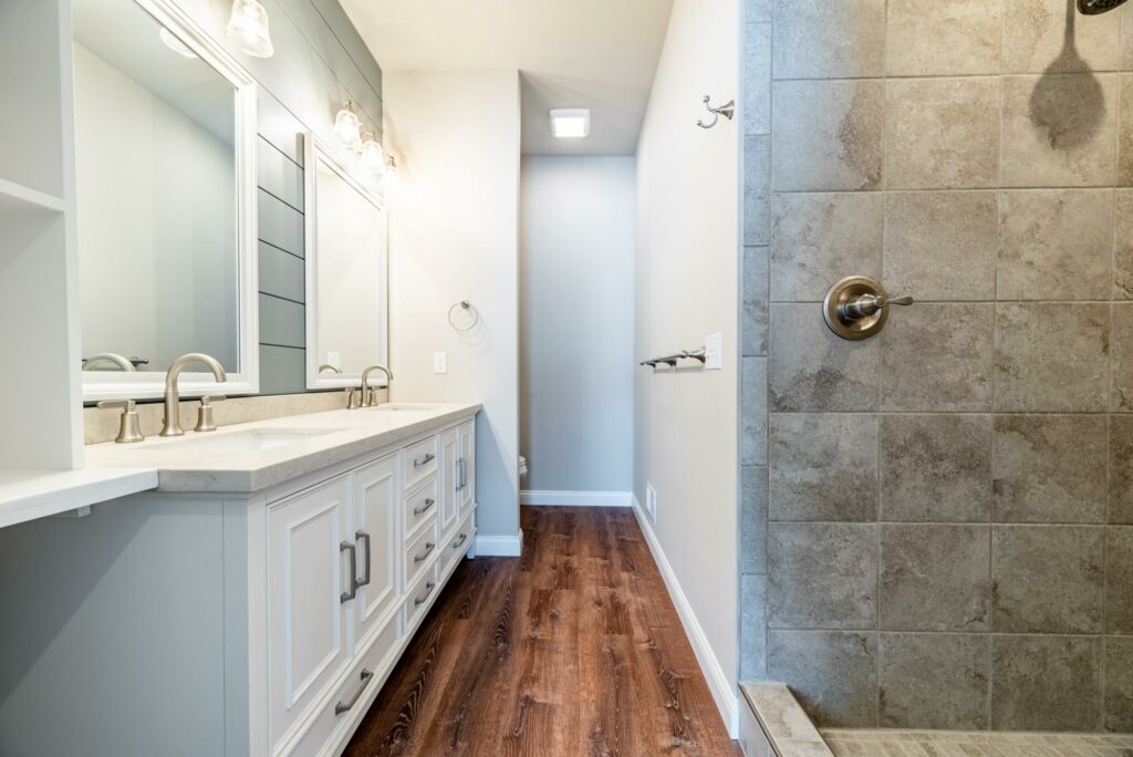 Renovated bathroom with a custom shower
